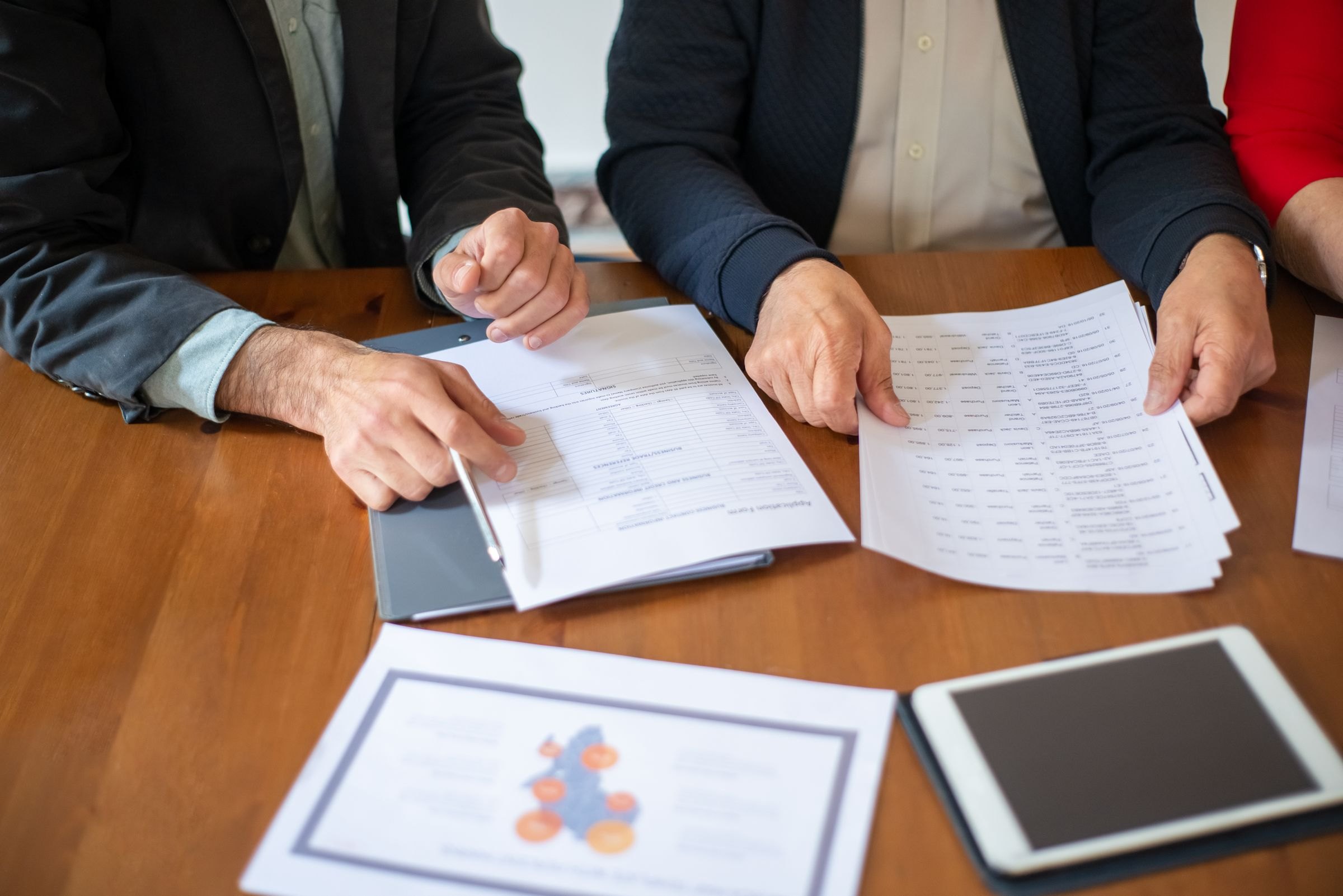 Business owners reviewing documents at a table